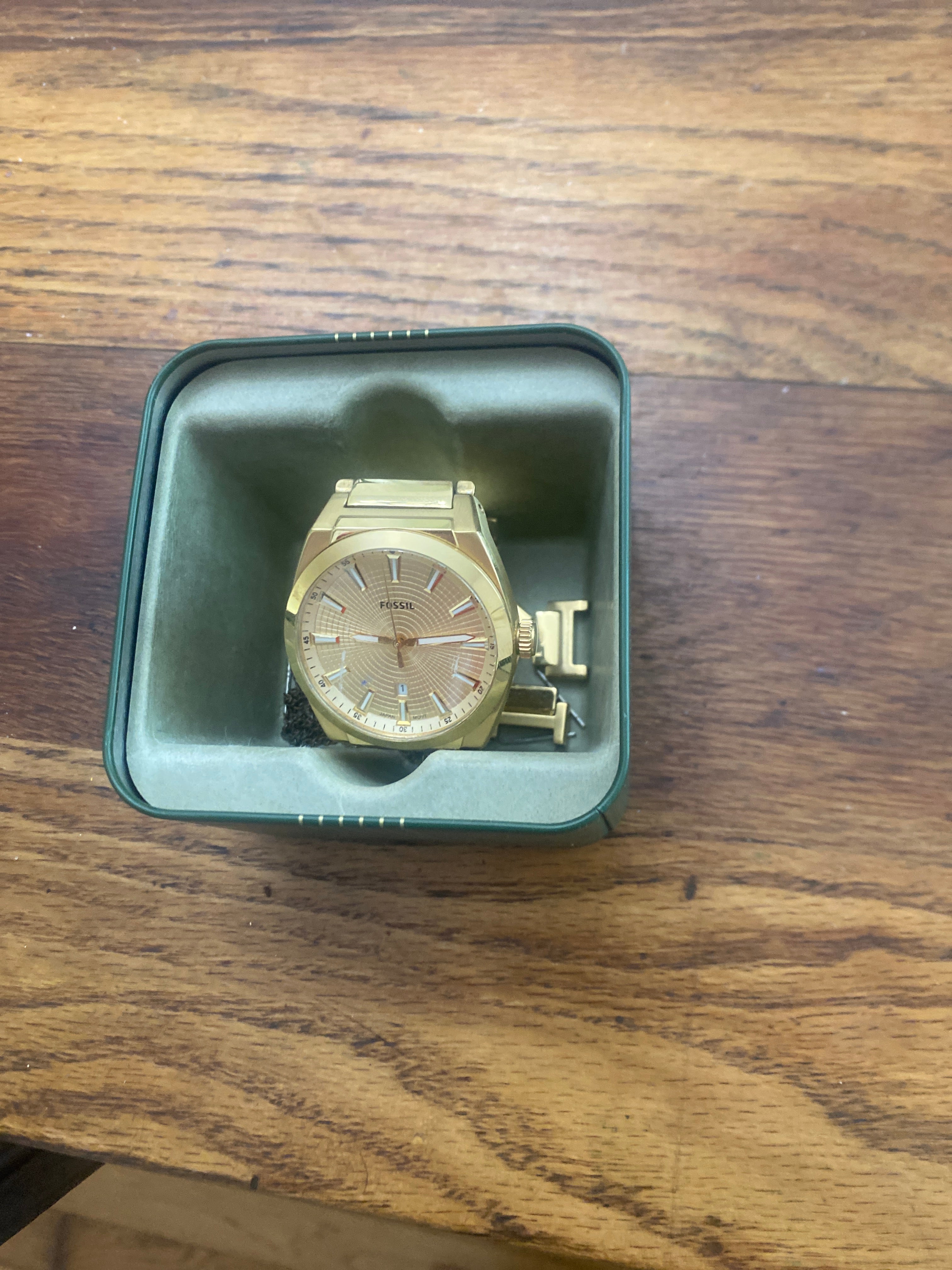 Gold Fossil Watch